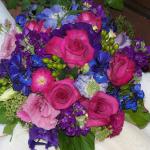 Dark Blue  Delphinium, Scabiosa, Stock, Pink Lisianthus, Green Hypericum Berries , Raspberry Roses
and dark pink Asters. 






